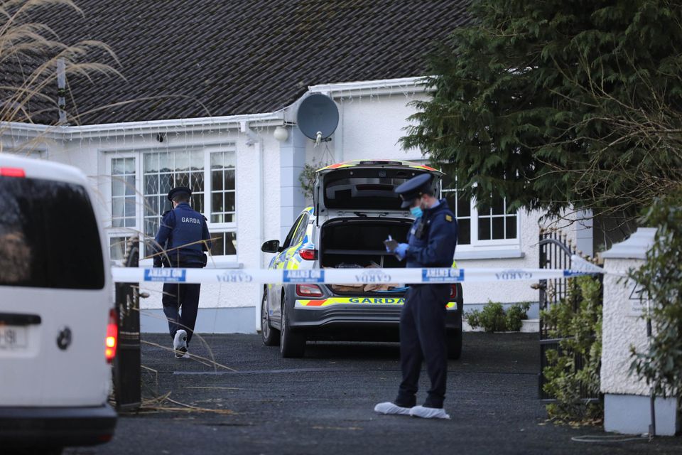 Gardaí at a house where the bodies of two men were discovered in Windyhall, Letterkenny, Co Donegal, on Thursday. Picture: Declan Doherty