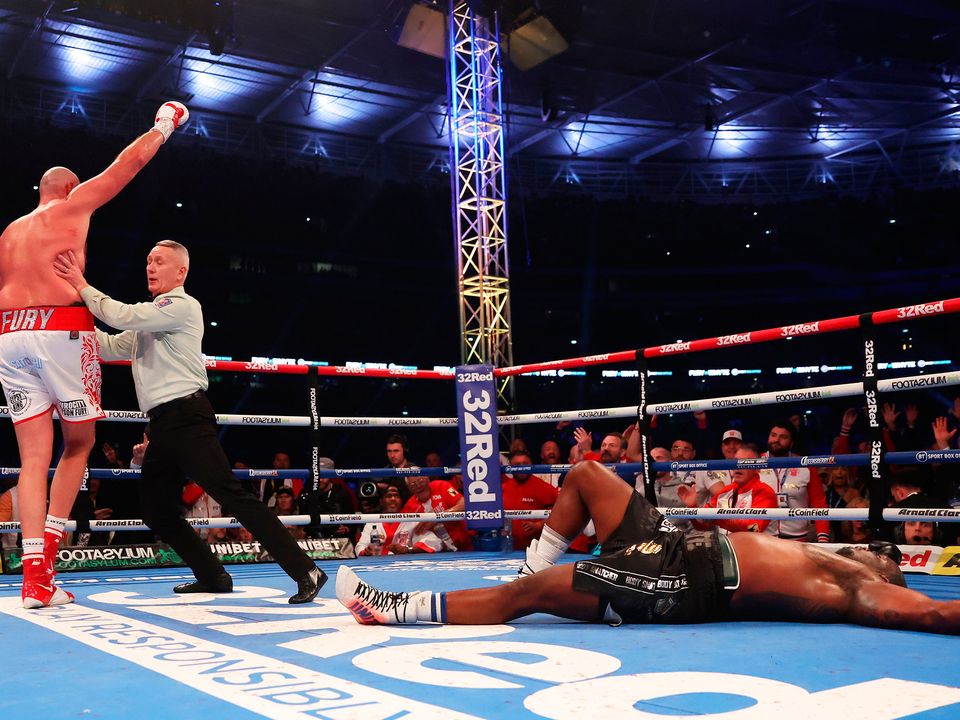 Tyson Fury reacts to knocking out Dillian Whyte after the WBC World Heavyweight title fight at Wembley Stadium. (Photo by Julian Finney/Getty Images)