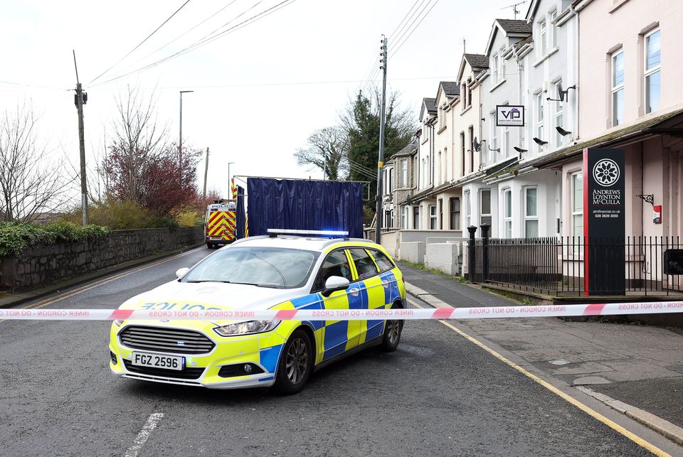 The scene on Church Street in Portadown where police are investigating the circumstances surrounding the death of a woman.