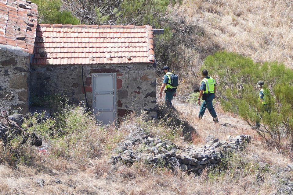 Search and rescue team members search the area close to Jay Slater's last known location (James Manning/PA)