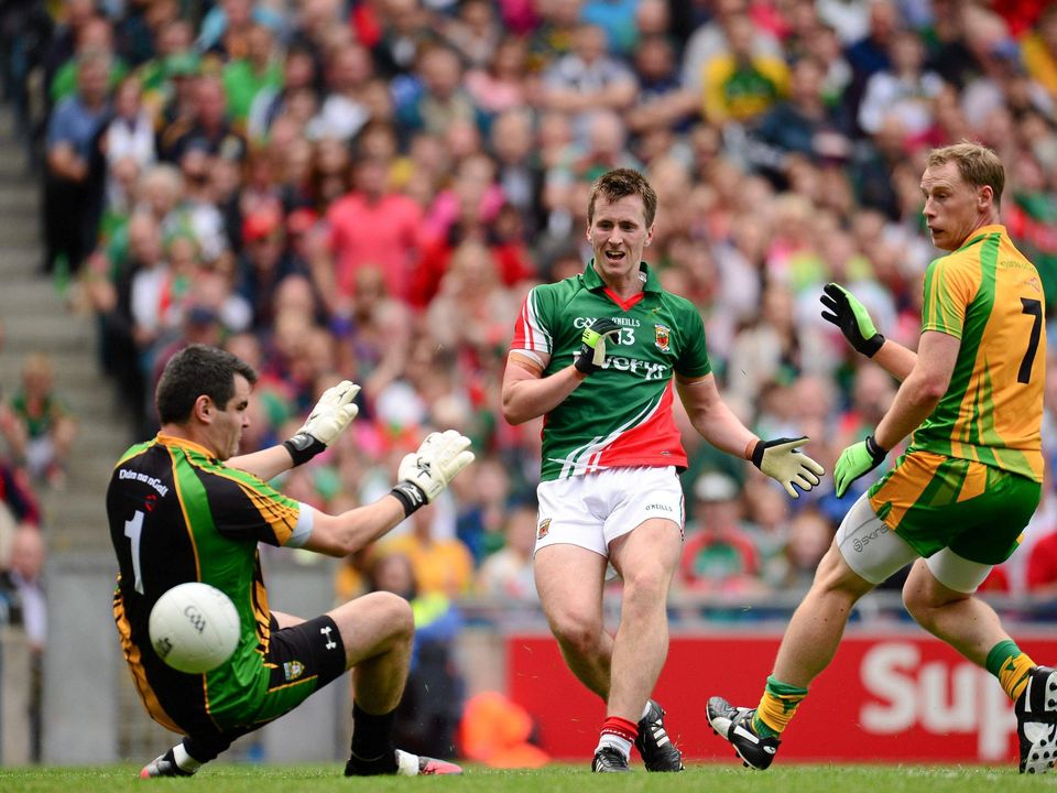Mayo’s Cillian O’Connor scores the first of his three goals against Donegal – as goalkeeper Paul Durcan and Anthony Thompson watch on – in the 2013 All-Ireland quarter-final in Croke Park. Photo: Sportsfile