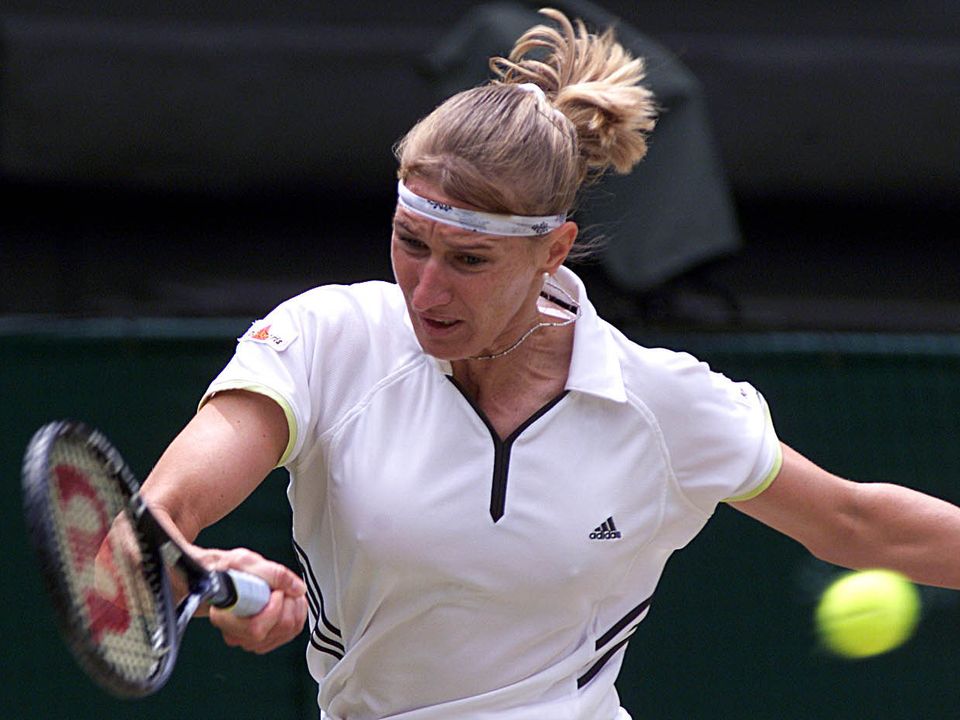 Germany's Steffi Graf in action against America's Lindsay Davenport during the Final of the Ladies' Singles at Wimbledon.