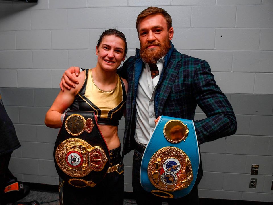 Conor McGregor poses with Katie Taylor. Photo: Sportsfile