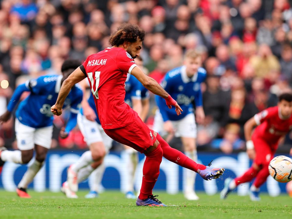 Mohamed Salah of Liverpool scores the team's first goal from a penalty against Everton. Photo: Jan Kruger/Getty Images