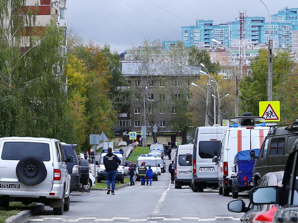 Police and members of the emergency services work near the scene of a school shooting in Izhevsk, Russia. Photo: Reuters