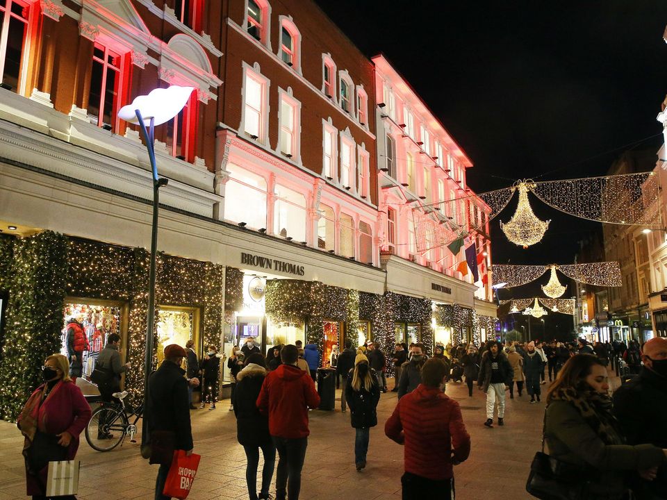 Christmas shoppers outside Brown Thomas on Dublin's Grafton Street yesterday. Photo: Stephen Collins/Collins Photos