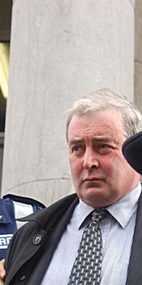 Former judge Brian Curtin walks free from Tralee Court House in 2004