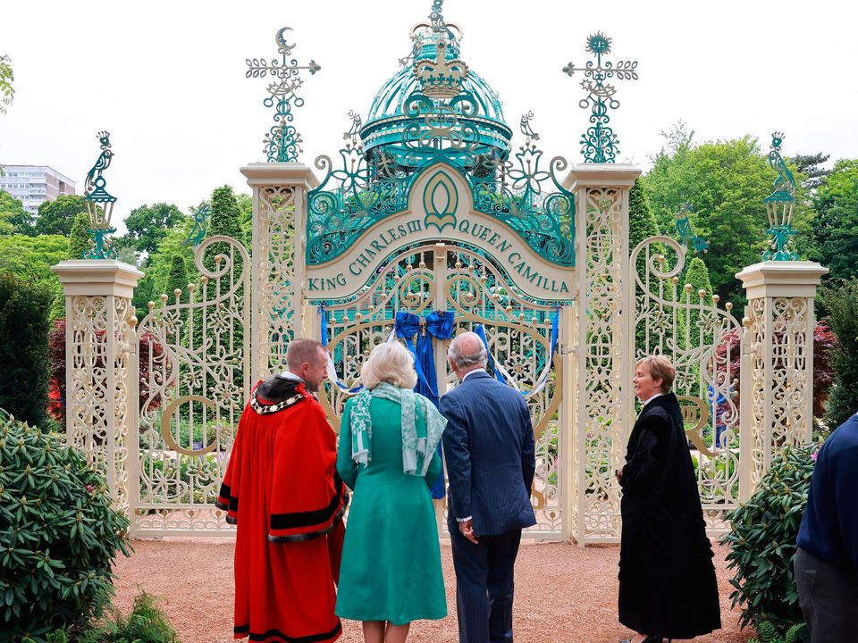 NEWTOWNABBEY, NORTHERN IRELAND - MAY 24: King Charles III and Queen Camilla during a visit to open the new Coronation Garden on day one of their two-day visit to Northern Ireland on May 24, 2023 in Newtownabbey, Northern Ireland. King Charles III and Queen Camilla are visiting Northern Ireland for the first time since their Coronation. Their Majesties will met designers of the Garden and representatives of community and charitable organisations, hearing how the Garden marks the beginning of a new green initiative for the Antrim and Newtownabbey Borough Council. (Photo by Chris Jackson/Getty Images)