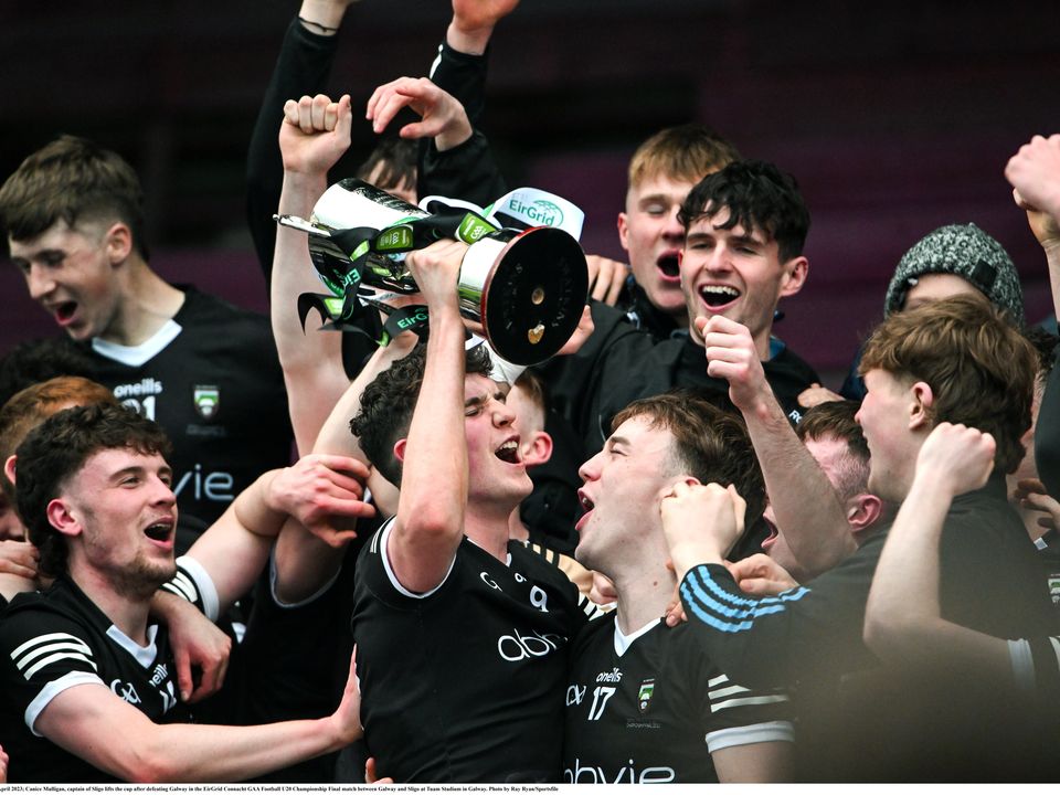 Sligo captain Canice Mulligan lifts the cup after their EirGrid Connacht Football U-20 Championship Final victory over Galway. Photo: Ray Ryan/Sportsfile