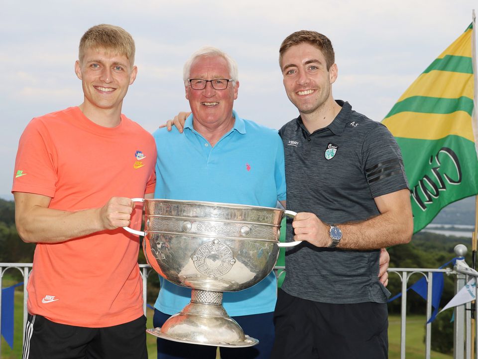 The Spillane's have football in their blood. L-R;  Killian, Pat & Adrian Spillane with the Sam Maguire Cup at Templenoe GAAs Ring of Kerry Golf Classic. Photo: Mary D O'Neill