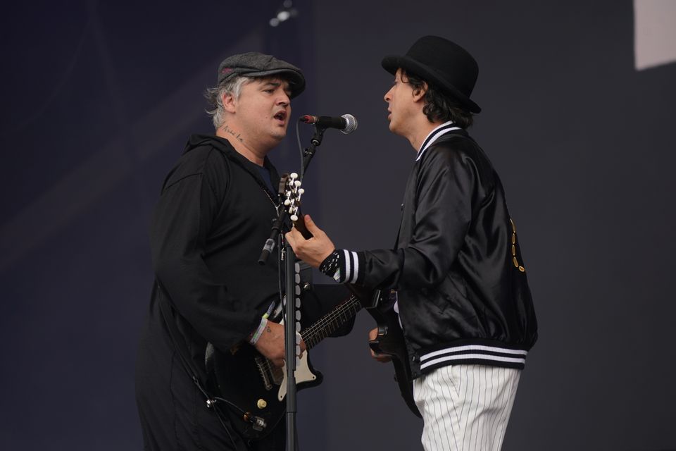 Pete Doherty and Carl Barat share lead vocal duties as The Libertines kick off the fun on the Other Stage (Yui Mok/PA)