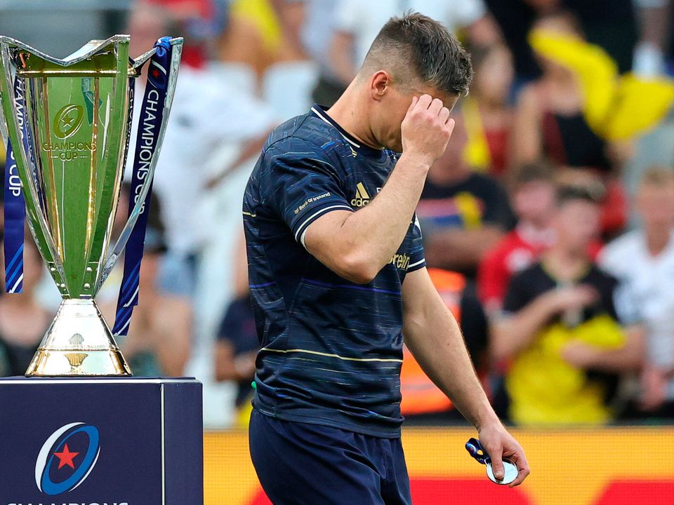 Johnny Sexton of Leinster holds his head as he walks past the Heineken Champions Cup. (Photo by David Rogers/Getty Images)