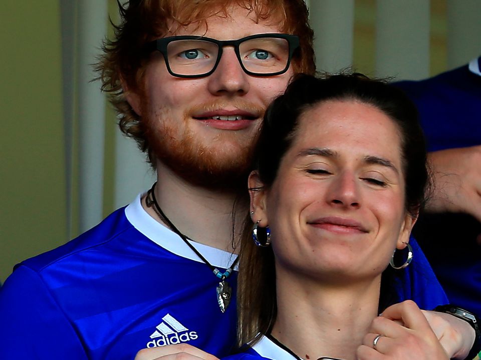 Musician Ed Sheeran and his fiancée Cherry Seaborn at the Sky Bet Championship match between Ipswich Town and Aston Villa at Portman Road on April 21, 2018 in Ipswich, England. (Photo by Stephen Pond/Getty Images)