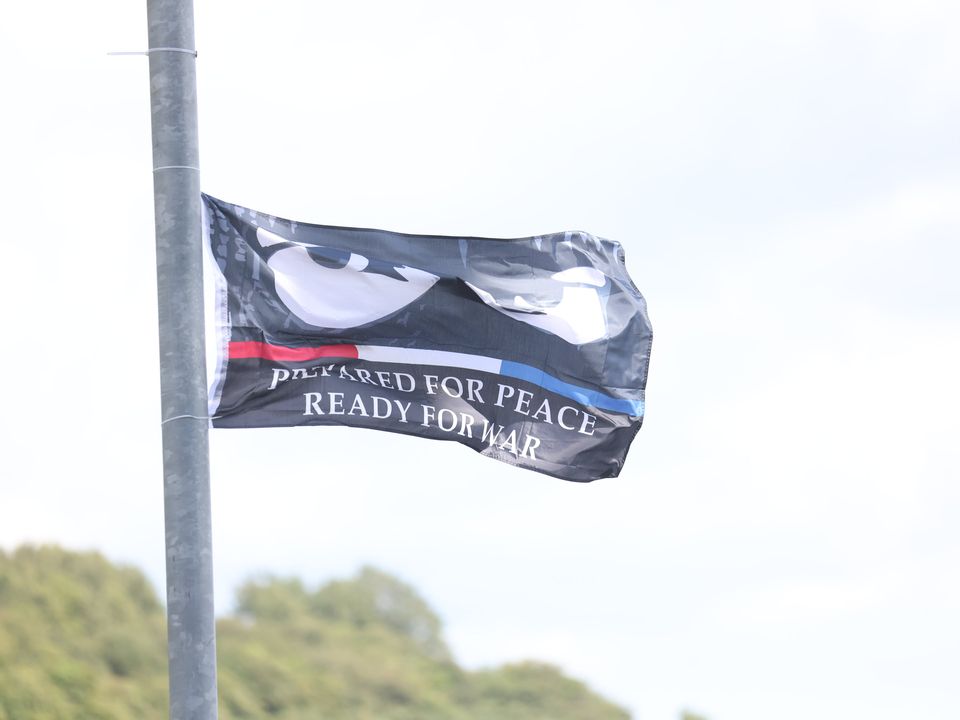 One of the flags outside the cemetery