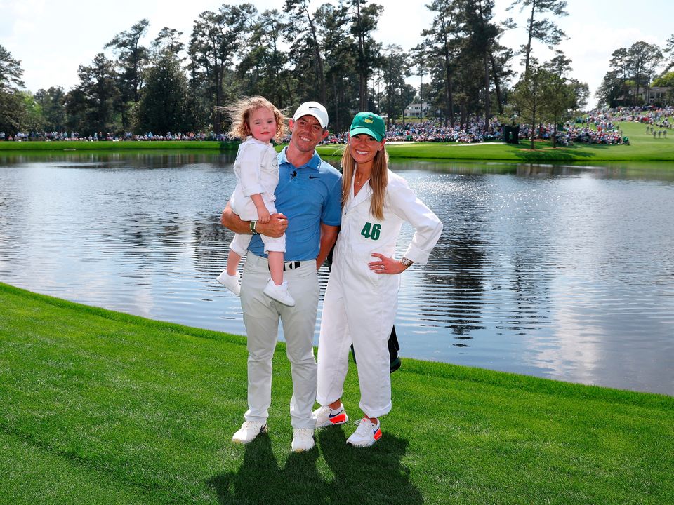 Rory McIlroy poses with his wife Erica and daughter Poppy