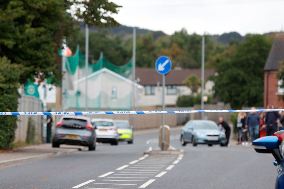 Police crime tape blocking the scene of a shooting at the clubhouse of Donegal Celtic Football Club, in west Belfast. Liam McBurney/PA Wire