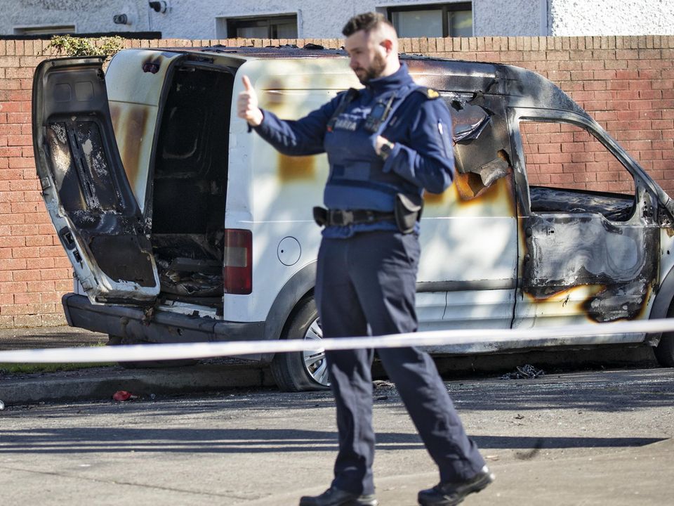 The suspected getaway vehicle used in the shooting of a man at Pimlico Cottages last night, pictured partially burned out in Oldchurch Drive, Clondalkin this morning....Picture Colin Keegan, Collins Dublin