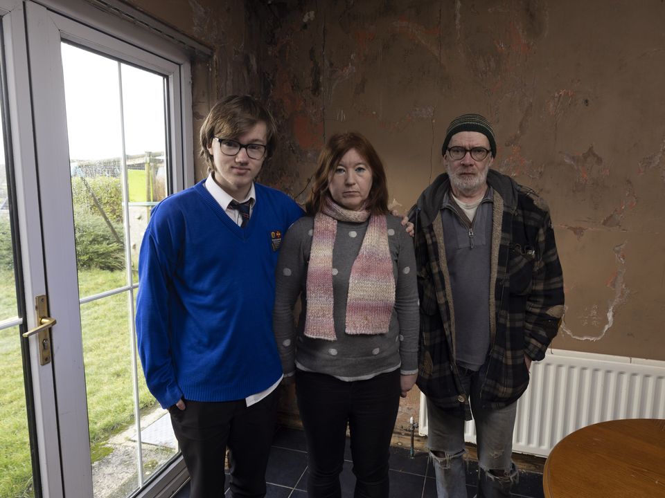 Sharon with her husband Kevin and son Sam in their mica-affected home in Letterkenny, Co Donegal. Photo: Joe Dunne