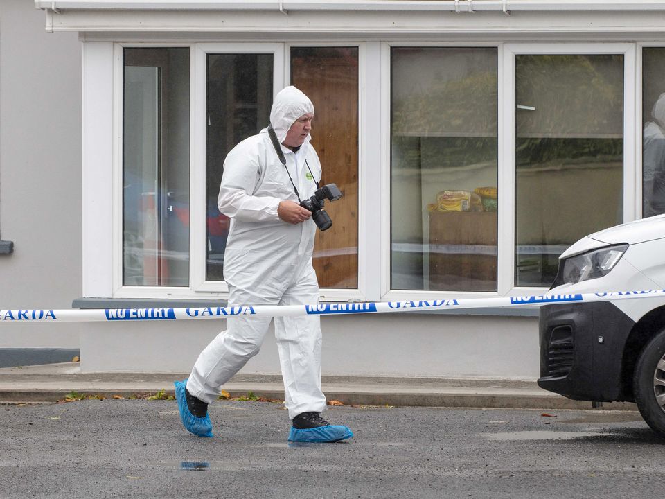 A forensic garda at the scene in Clarecastle  on the outskirts of Ennis, Co Clare. Photo: Press 22