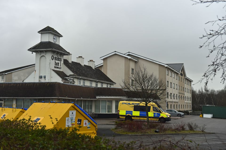 Police outside the Suites Hotel in Knowsley (Peter Powell/PA)
