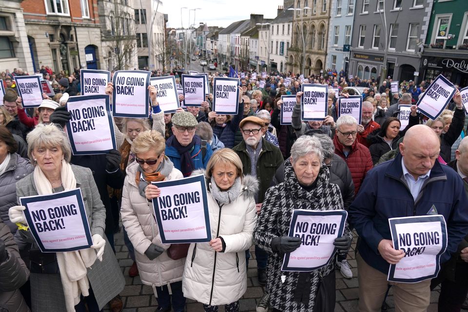 People taking part in a rally outside Omagh Courthouse to unite against paramilitary violence following the shooting of Detective Chief Inspector John Caldwell (Brian Lawless/PA)