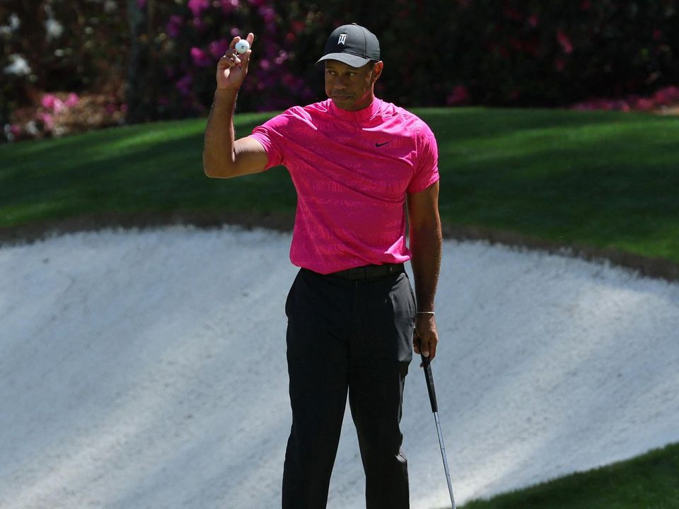 Tiger Woods reacts after a birdie putt on the 13th during the first round of The Masters at Augusta National Golf Club, Augusta, Georgia