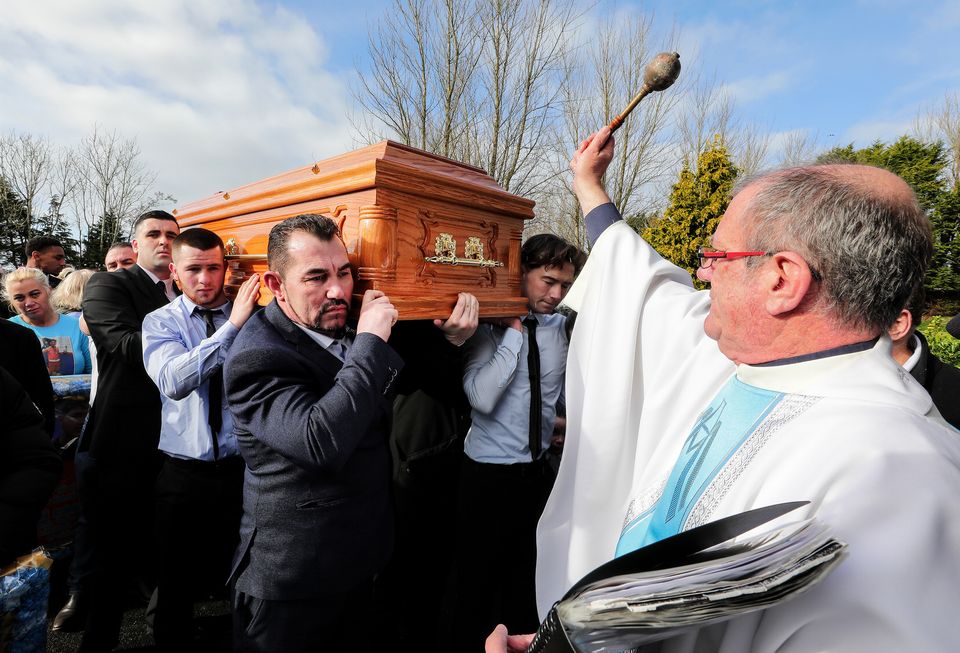 Fr. Kevin Blade blesses the remains of John Keenan Sammon as they arrive for funeral mass at The Church of the Resurrection in Galway. Picture; Gerry Mooney