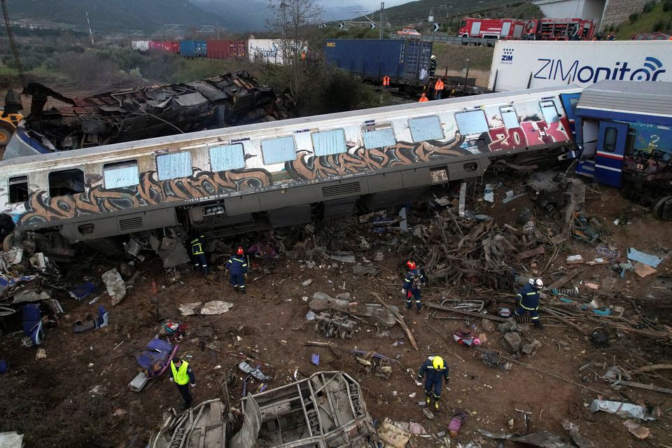 Rescue crews operate at the site of a crash, where two trains collided, near the city of Larissa, Greece, March 1, 2023. REUTERS/Alexandros Avramidis