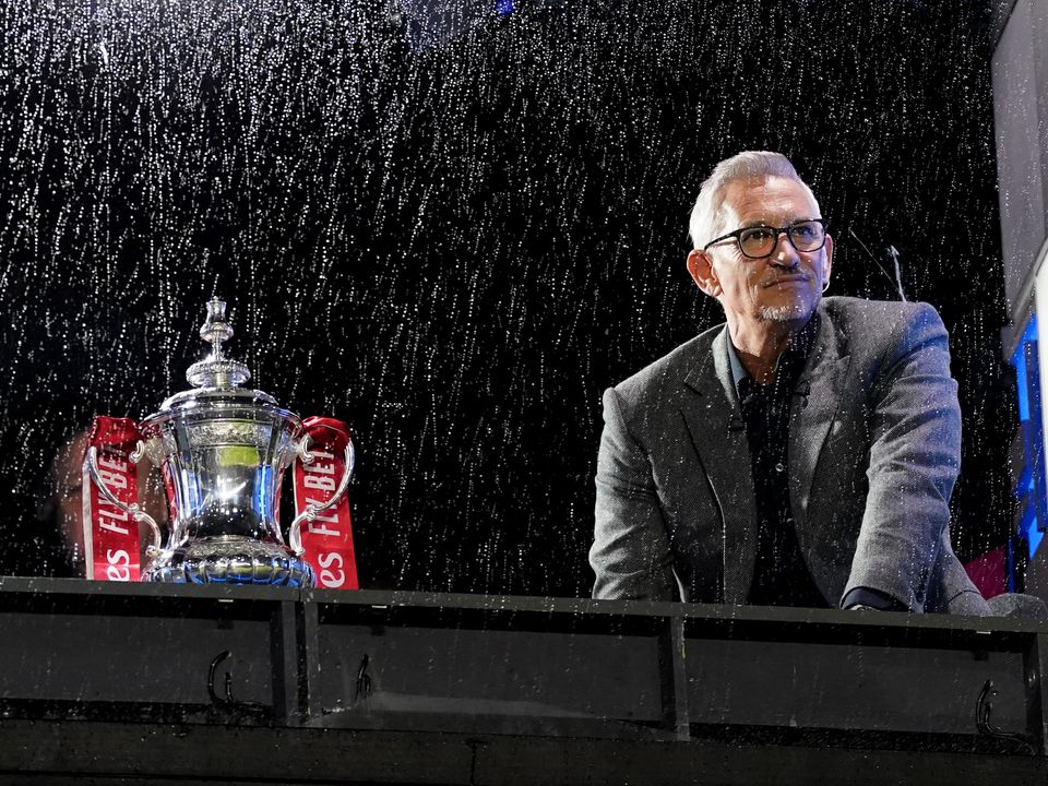 BBC presenter Gary Lineker with the FA Cup during the Emirates FA Cup third round match at the Hillsborough Stadium, Sheffield. Picture date: Saturday January 7, 2023.