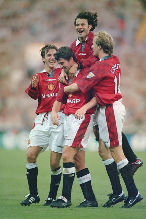 Jordi Cruyff celebrating a goal in August 1996 with David Beckham, Roy Keane and Ryan Giggs. (Photo by Shaun Botterill/Allsport/Getty Images/Hulton Archive)