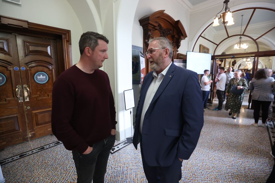 Sinn Fein’s John Finucane (left) and Ulster Unionist Party (UUP) leader Doug Beattie speaking at the Northern Ireland council elections at Belfast City Hall (Liam McBurney/PA)