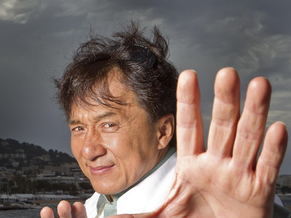 Jackie Chan poses for portraits in Cannes. Photo: AP Photo/Joel Ryan