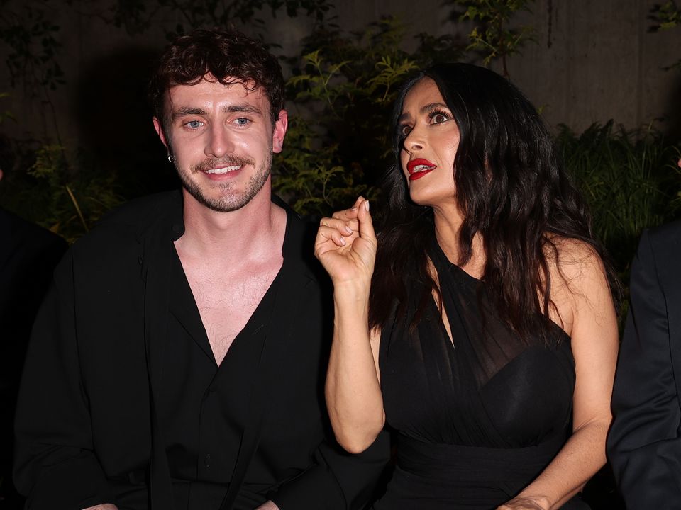 Paul Mescal and Salma Hayek attend the Gucci Cruise 2025 Fashion Show at Tate Modern. Photo by Tristan Fewings/Getty Images for Gucci