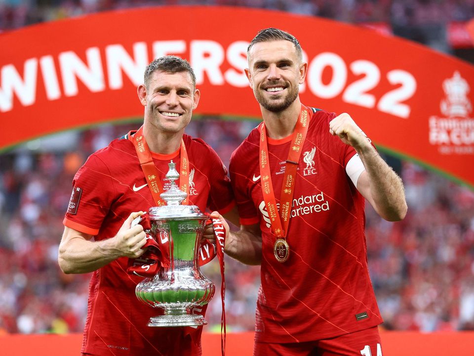 Liverpool's James Milner and Jordan Henderson celebrate with FA Cup. Photo: Hannah Mckay/Reuters