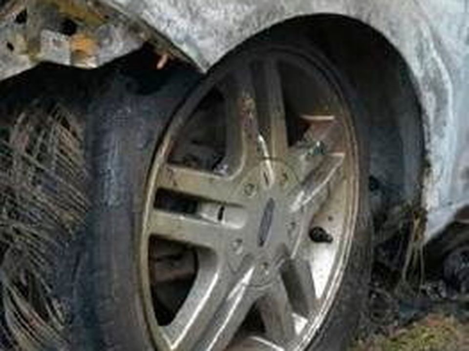 Picture of Ford Fiesta car and (below) picture of distinct alloy wheel.