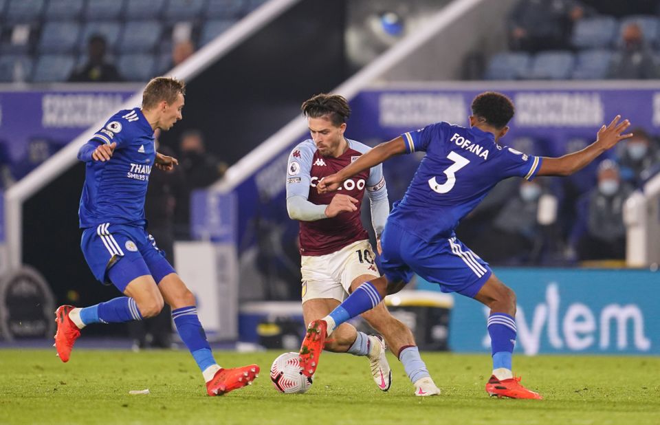 Aston Villa’s Jack Grealish battles for the ball with Leicester’s Timothy Castagne and Wesley Fofana (Jon Super/PA)