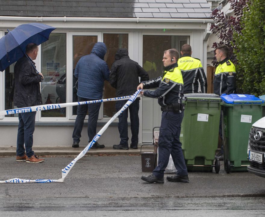 Gardaí at the scene where a child was found badly injured in Ennis, Co Clare. Photo: Press 22