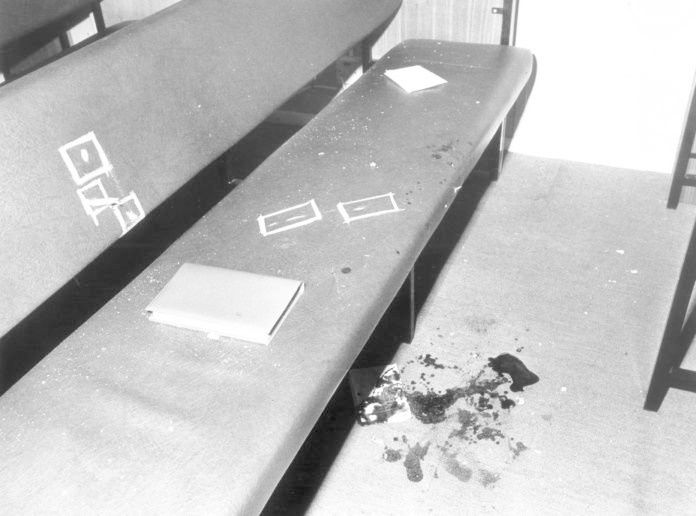 Inside the bullet riddled gospel hall, where bloodstained pews show the horror of what unfolded.