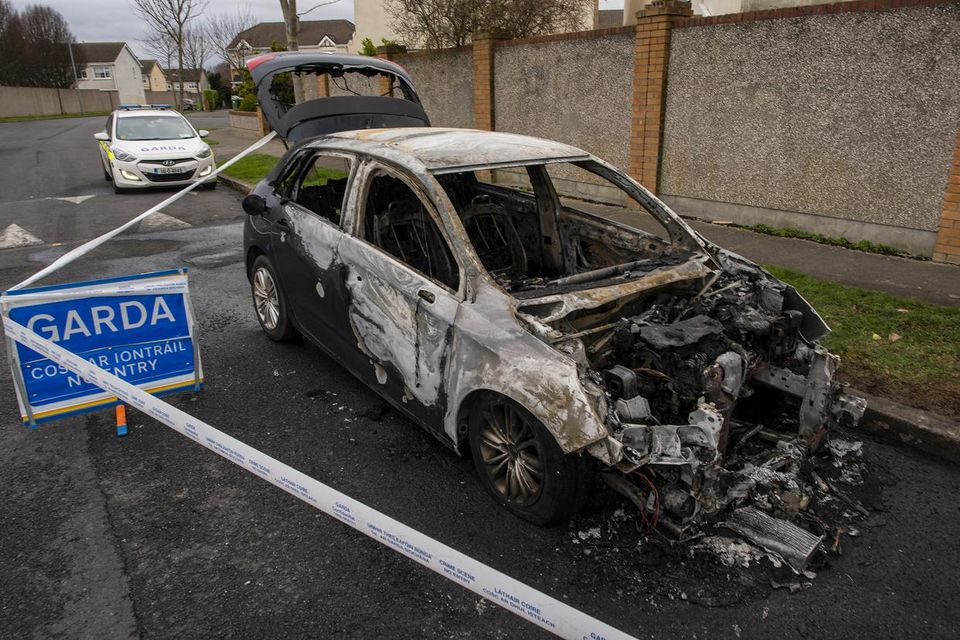 Barry Wolverson  had been shot dead and his killers made their getaway before burning their car