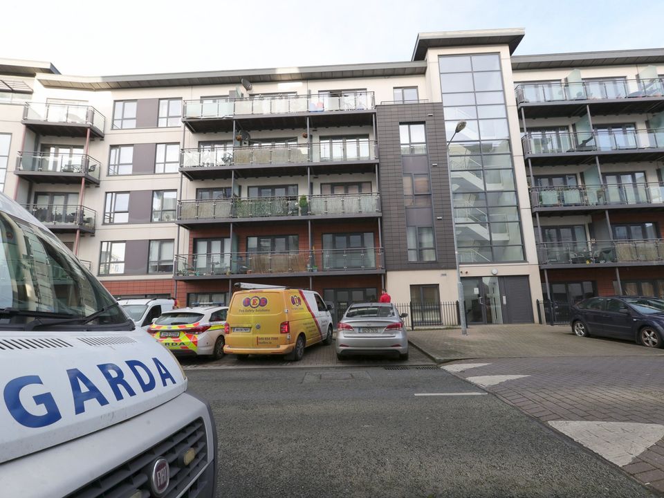 Garda vehicles outside a block of apartments in Royal Canal Park, Ashtown, west Dublin, yesterday where a woman's body was discovered. Photo: Colin Keegan/Collins