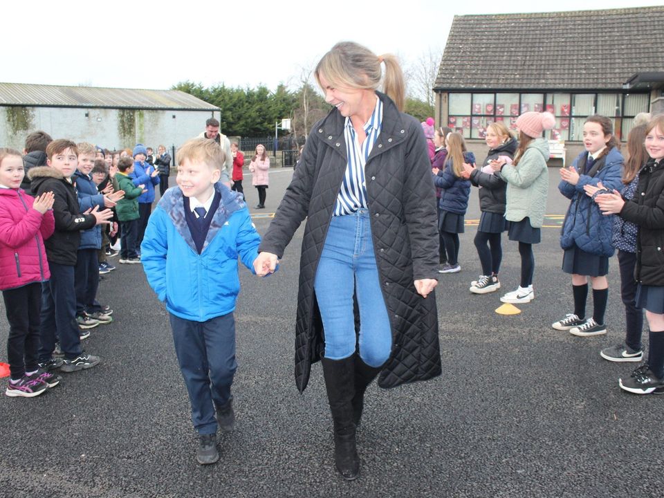 Little Harry Kieran McGreary received a hero's welcome when he walked into Knockbridge NS with his mum Emma after finishing treatment for cancer