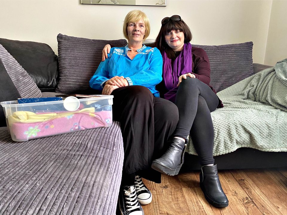 Miriam, left, showing Dee Callis, Head of Debra’s Family Support Team, Katie’s box of Katie’s mementos. Photo: Debra.