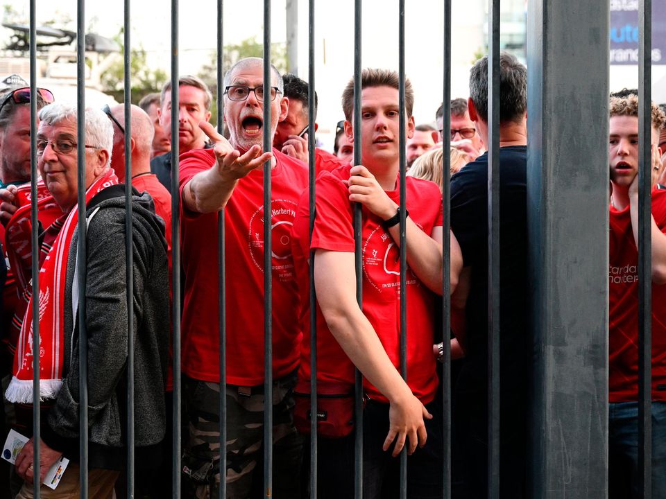 Liverpool fans queue outside the stadium prior to the Champions League final at the Stade de France. (Photo: Getty Images).