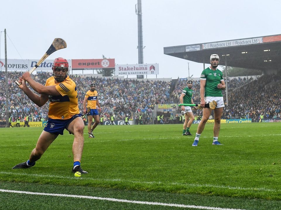 Peter Duggan of Clare takes a sideline cut during the Munster final against Limerick.