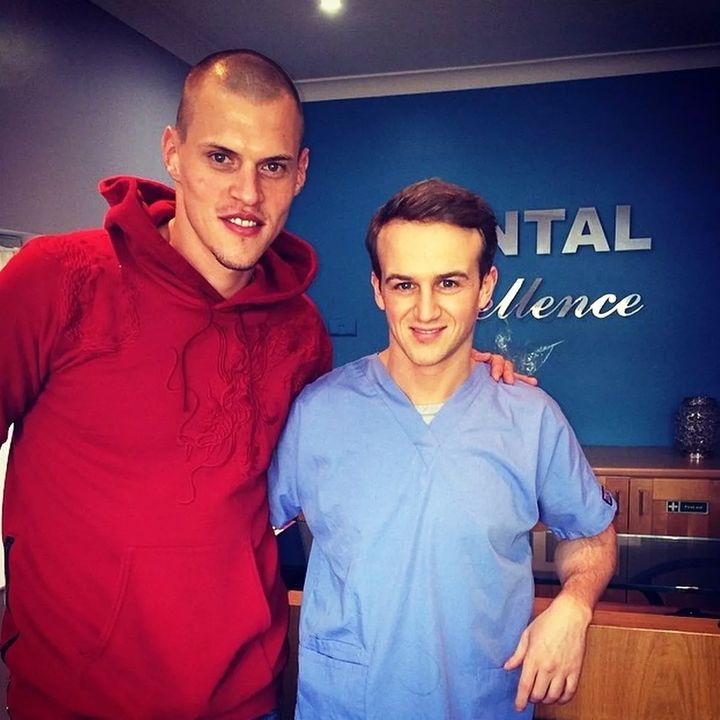 Dr Robbie Hughes with former Liverpool player Martin Skrtel