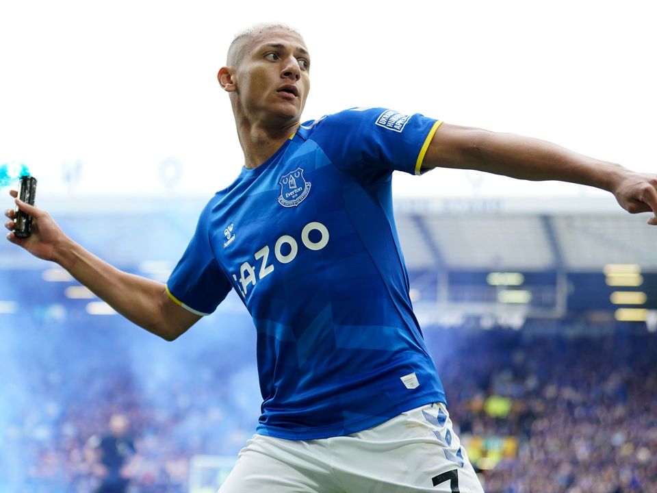 Everton striker Richarlison throws a smoke canister after scoring his side’s winner against Chelsea at Goodison Park (Jon Super/PA)