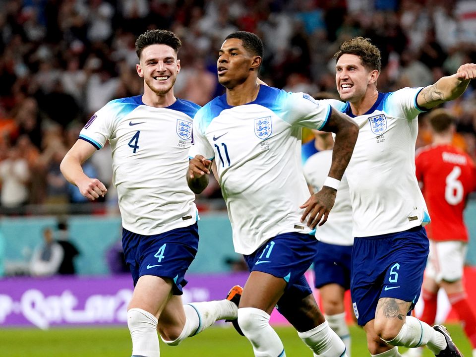 England's Marcus Rashford (centre) celebrates scoring the opening goal of the game during the FIFA World Cup Group B match at the Ahmad Bin Ali Stadium, Al Rayyan, Qatar. Picture date: Tuesday November 29, 2022.