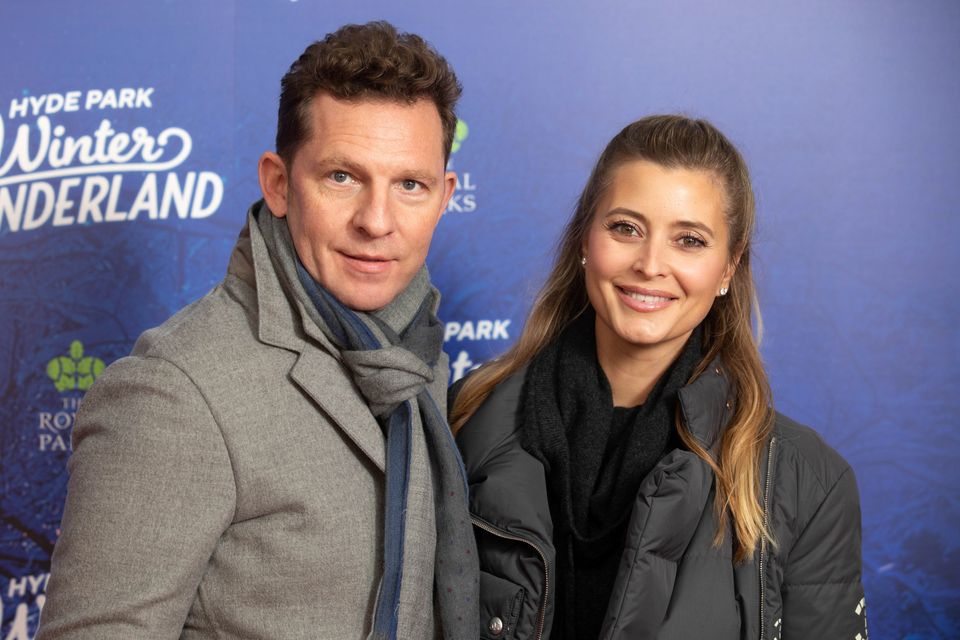 Nick Candy, left, with wife Holly Valance, right, was one of the early bidders vying to buy Chelsea (David Parry/PA)