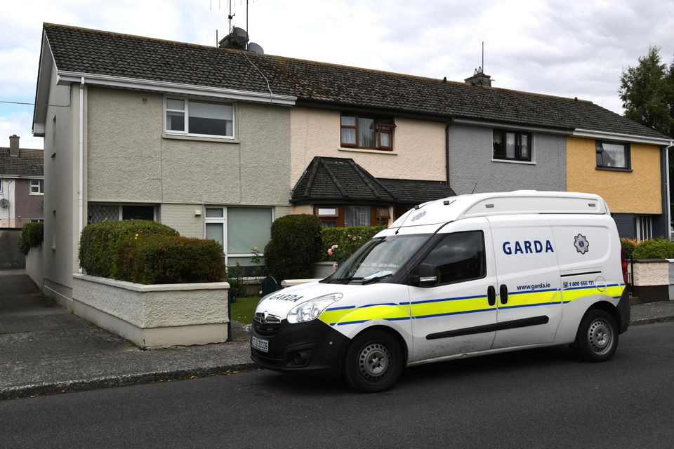 Gardaí at the home of Miriam Burns in Killarney. Photo: Don MacMonagle