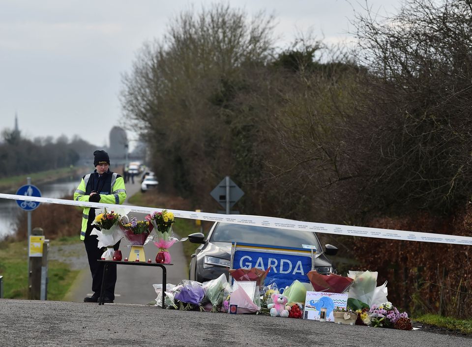 Gardaí at the crime scene on the canal bank in Tullamore where Ashling Murphy's body was discovered. Photo: Charles McQuillan/Getty